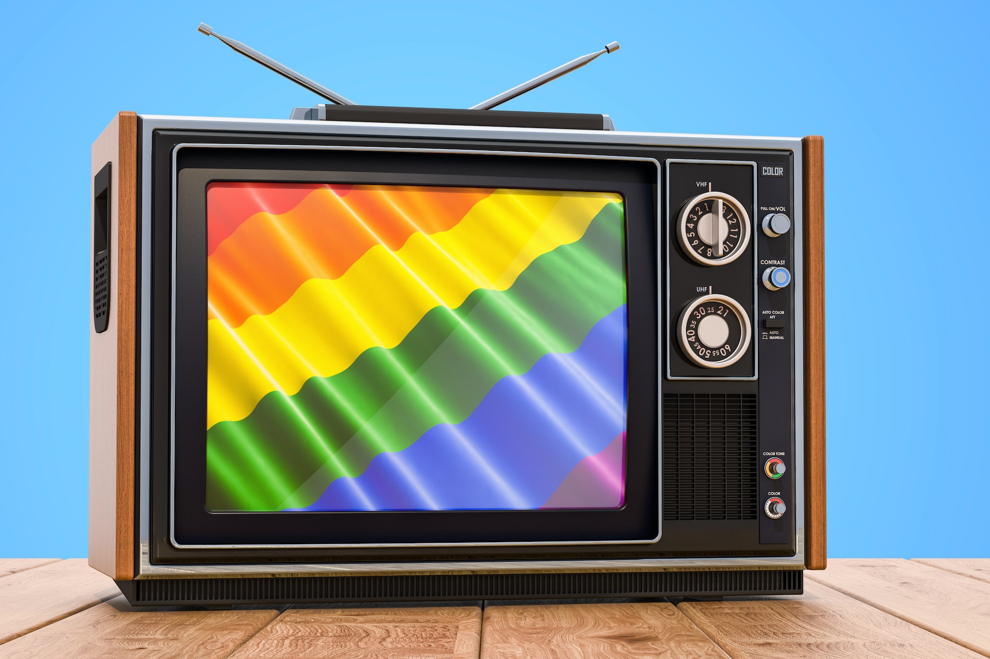 Vintage TV with rainbow flag background.