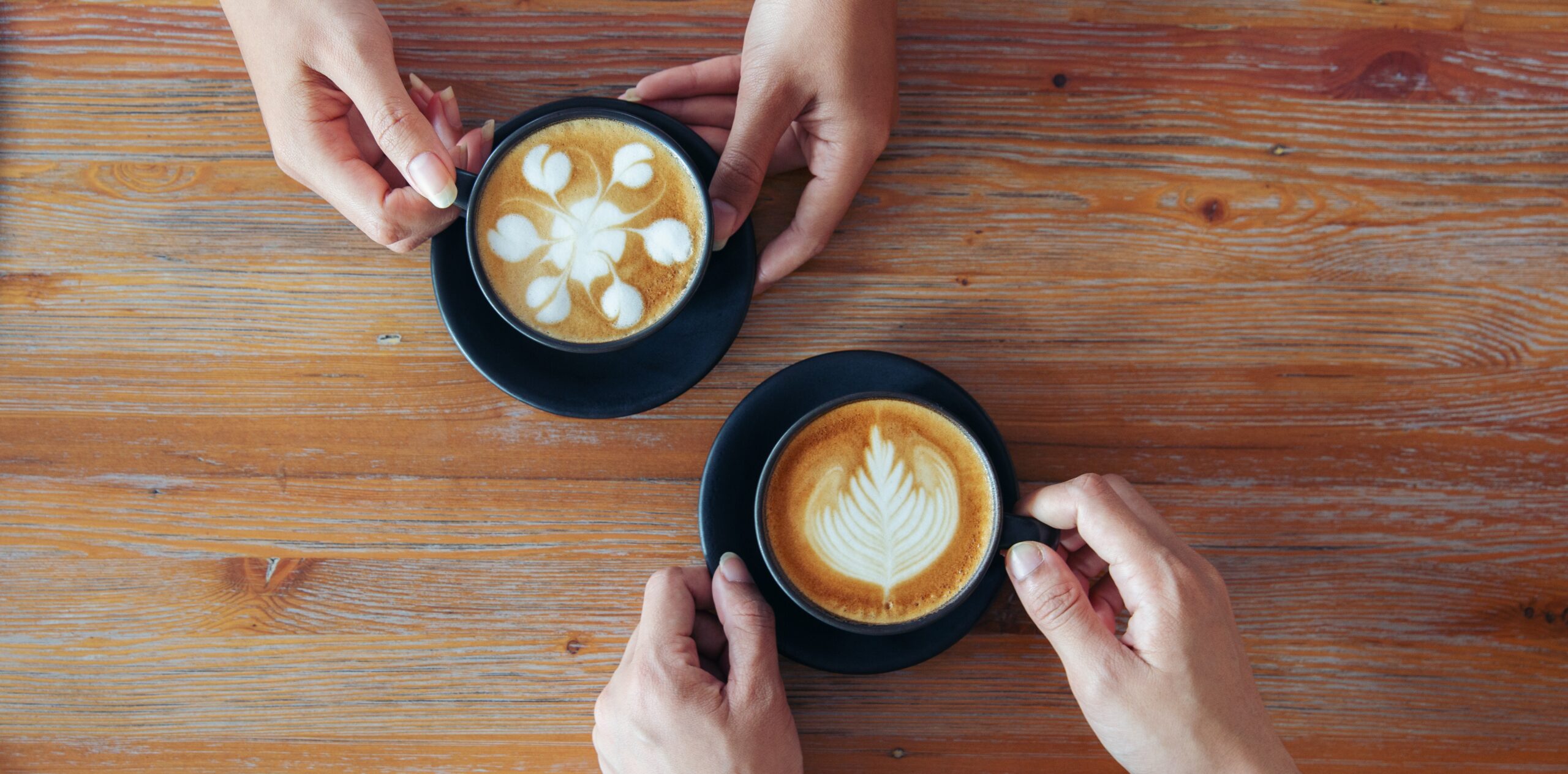 two cups of coffee on a table