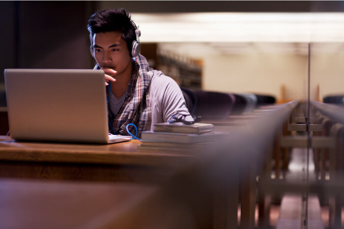Man Looking at Laptop