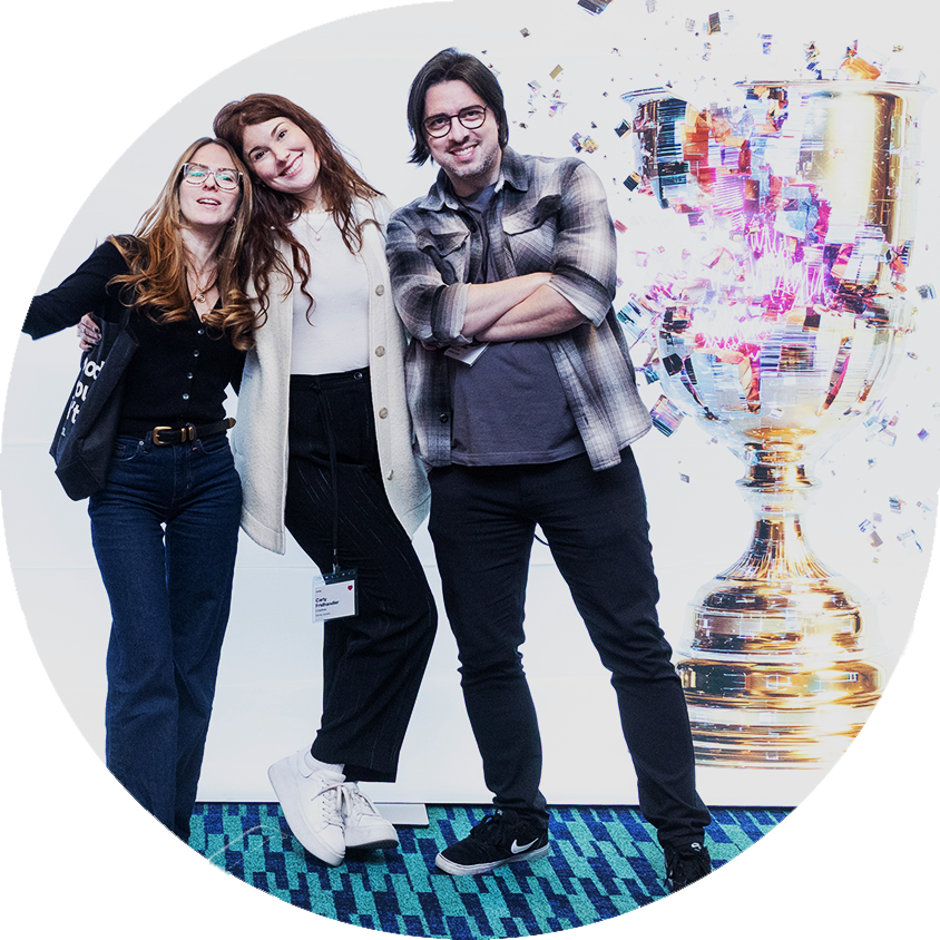 Team in front of trophy backdrop