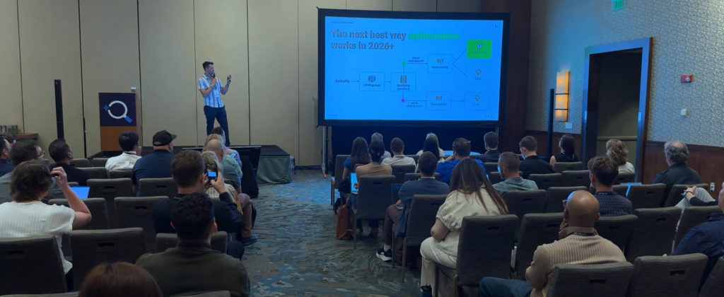 Level Agency presenter on stage at SMX Advanced 2026 with a packed room and slide showing an AI lead scoring funnel diagram