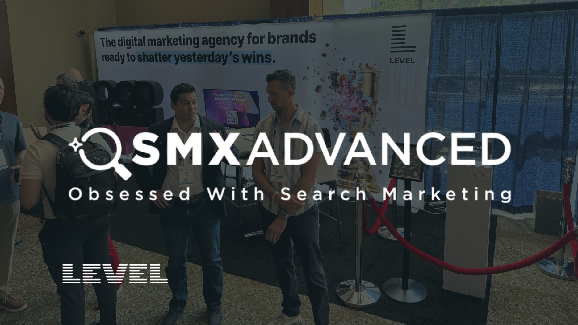Level Agency booth at SMX Advanced 2026 with attendees gathered on the expo floor.