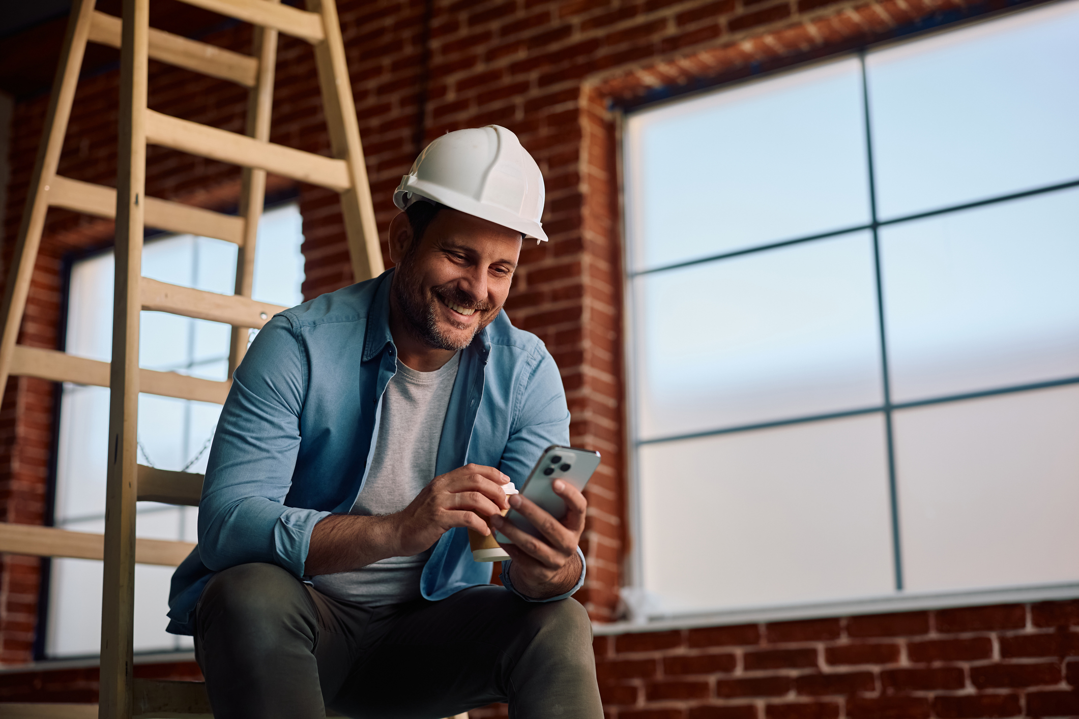 Contractor interacting with Meta Business Agent on his mobile device